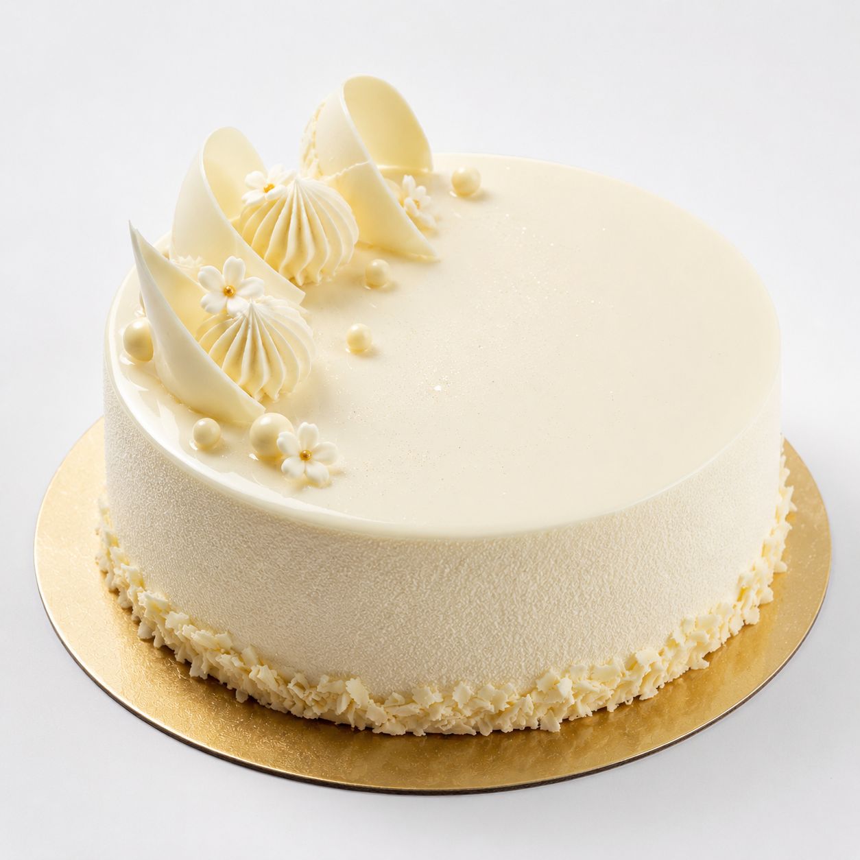Vanilla Cake
Eggless vanilla cake with elegant smooth white velvet finish, white chocolate sail decorations, piped cream rosettes, white sugar pearls and delicate fondant flowers on gold board ,freshly baked and available to order online at Pam's Bakery, Sector 75, Spectrum Metro Mall, Noida